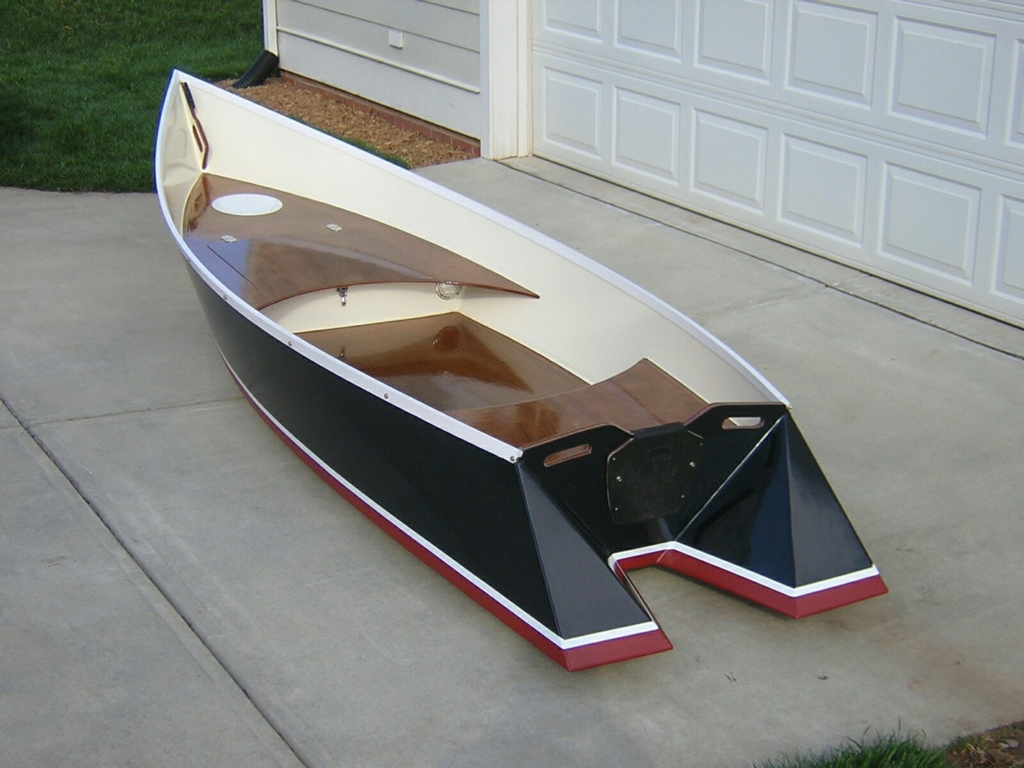 The Original Tango Skiff by Hank Bravo